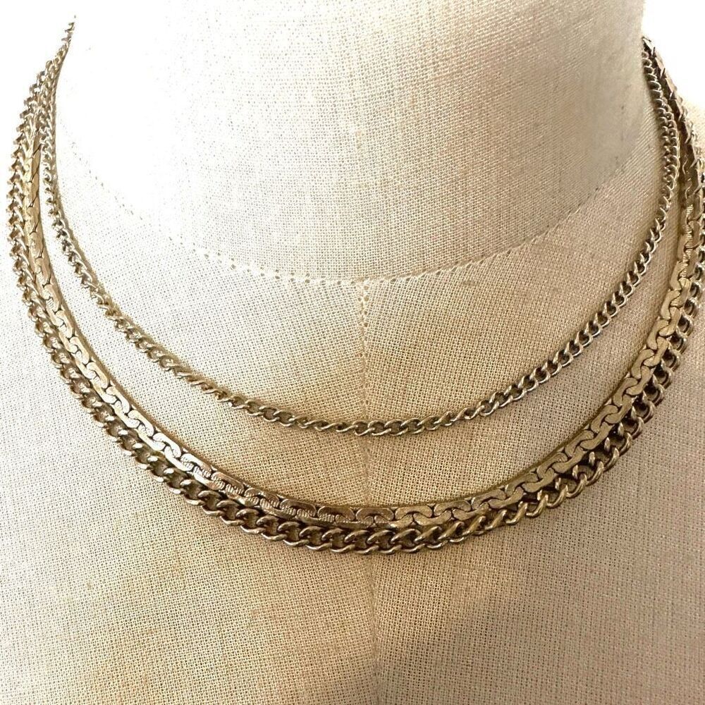 Gold tone multi chain necklace